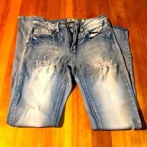 Women’s distressed skinny leg jeans
